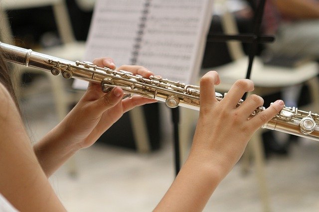 Flautist playing flute